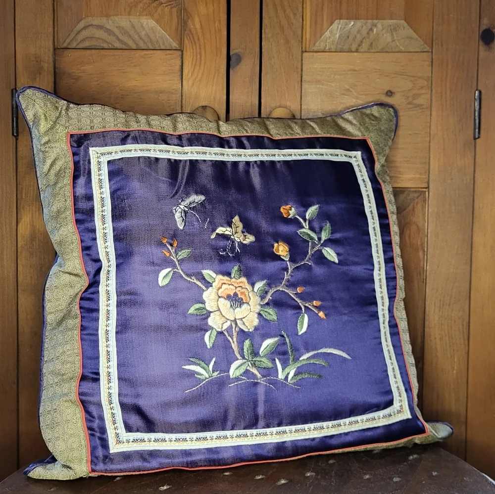 Floral Embroidered Cushion with Blue and Green Accents